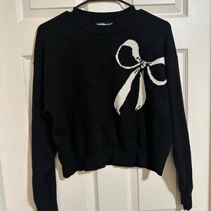Black Sweater with White Bow design